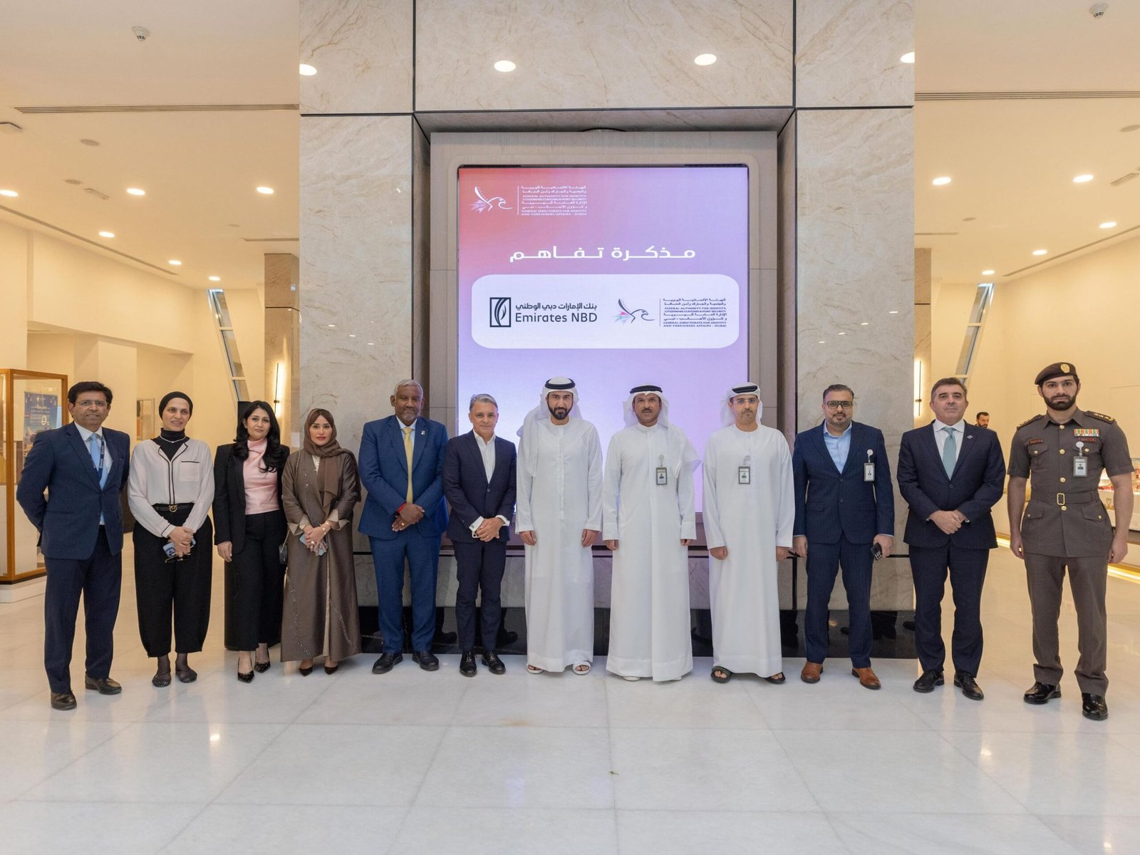 الهوية بدبي وبنك الإمارات دبي الوطني يتعاونان لتكامل الخدمات المصرفية و الإقامات